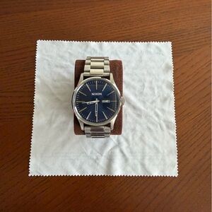 Nixon Men's Watch with Silver Metal Band and Deep Blue Dial